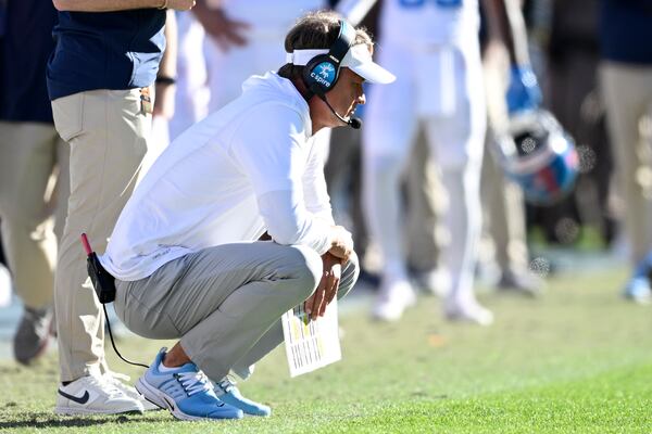 Mississippi head coach Lane Kiffin reacts on the sideline during the second half of an NCAA college football game against Florida, Saturday, Nov. 23, 2024, in Gainesville, Fla. (AP Photo/Phelan M. Ebenhack)