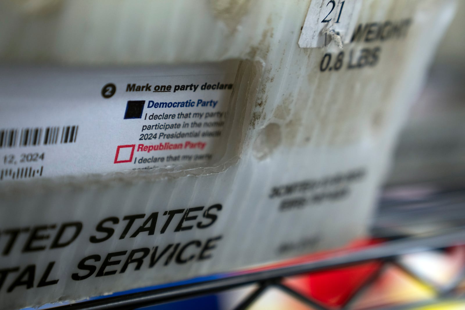 FILE - Vote-by-mail ballots for the presidential primary election are seen on March 12, 2024, at the Clark County Elections Office in Vancouver, Wash. (AP Photo/Jenny Kane, File)