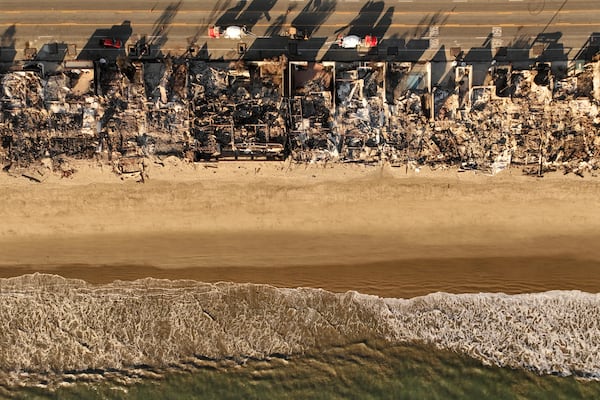 An aerial view shows the devastation by the Palisades Fire Thursday, Jan. 16, 2025 in Malibu, Calif. (AP Photo/Jae C. Hong)