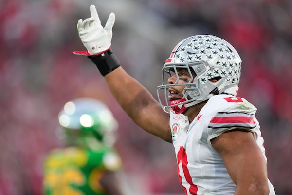 Ohio State linebacker Cody Simon (0) celebrates his sack against Oregon during the second half in the quarterfinals of the Rose Bowl College Football Playoff, Wednesday, Jan. 1, 2025, in Pasadena, Calif. (AP Photo/Mark J. Terrill)