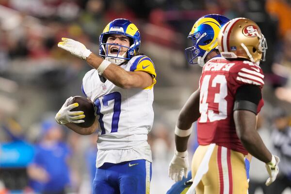 Los Angeles Rams wide receiver Puka Nacua (17) reacts after catching a pass against the San Francisco 49ers during the second half of an NFL football game in Santa Clara, Calif., Thursday, Dec. 12, 2024. (AP Photo/Godofredo A. Vásquez)