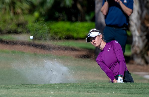 Nelly Korda hits from the sand on the sixth hole during the first round of the LPGA CME Group Tour Championship golf tournament Thursday, Nov. 21, 2024, in Naples, Fla. (AP Photo/Chris Tilley)