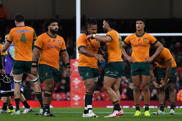 Australian players celebrate winning the Autumn Nations series rugby union match between Wales and Australia at the Principality Stadium in Cardiff, Wales, Sunday, Nov. 17, 2024.(AP Photo/Rui Vieira)