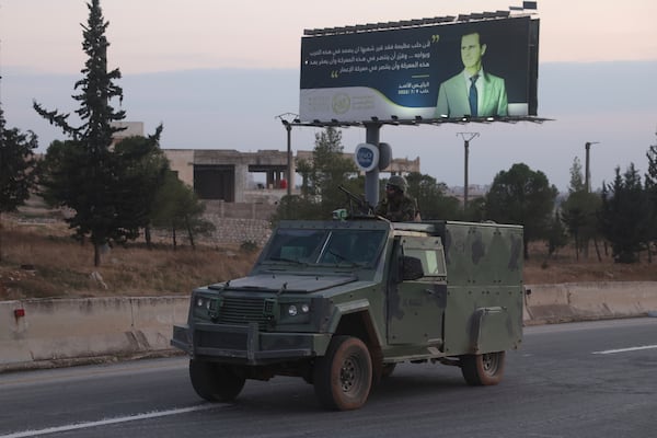 Opposition forces take control of areas outside Aleppo, Syria, Friday, Nov. 29, 2024. (AP Photo/Ghaith Alsayed)