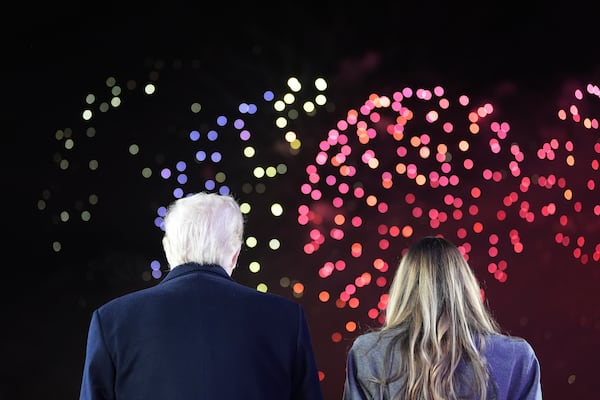 President-elect Donald Trump, Melania Trump and family watch fireworks at Trump National Golf Club, Saturday, Jan. 18, 2025, in Sterling, Va. (AP Photo/Alex Brandon, Pool)