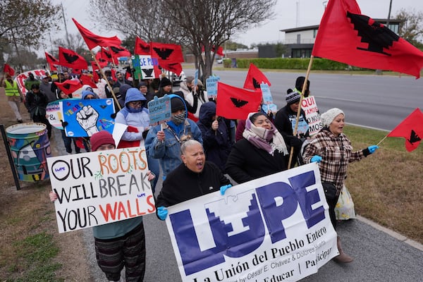 La Union del Pueblo Entero (LUPE), meaning The Union of the Entire People, march to protest the inauguration of incoming President-elect Donald Trump, Monday, Jan. 20, 2025, in McAllen, Texas. (AP Photo/Eric Gay)