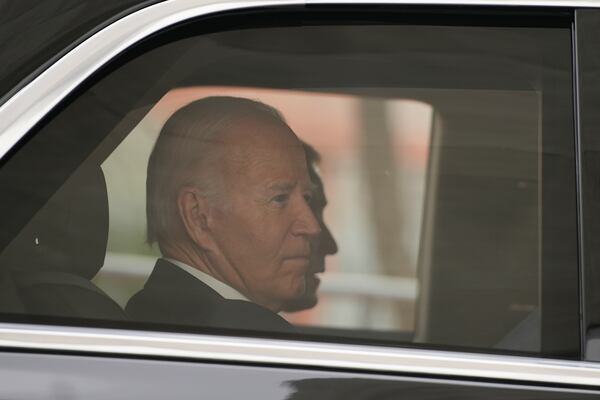 U.S. President Joe Biden arrives by car to the Asia-Pacific Economic Cooperation (APEC) summit in Lima, Peru, Saturday, Nov. 16, 2024. (AP Photo/Guadalupe Pardo)