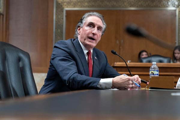 Former Gov. Doug Burgum, President-elect Donald Trump's choice to lead the the Interior Department as Secretary of the Interior, testifies before the Senate Energy and Natural Resources Committee on Capitol Hill in Washington, Thursday, Jan. 16, 2025. (AP Photo/Jose Luis Magana)