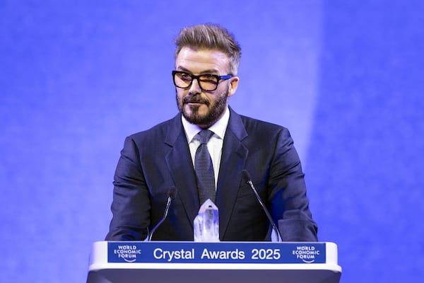 David Beckham speaks as he receives a Crystal Award, at the 55th annual meeting of the World Economic Forum, WEF, in Davos, Switzerland, Monday, Jan. 20, 2025. (Michael Buholzer/Keystone via AP)