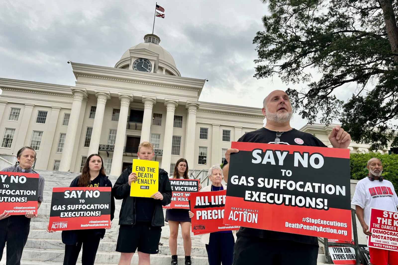 FILE - Abraham Bonowitz, executive director of Death Penalty Action, and other death penalty opponents hold a demonstration outside the Alabama Capitol in Montgomery, Ala., Wednesday, Sept. 25, 2024, asking the state to call off the scheduled execution of Alan Miller in what would be the nation's second execution using nitrogen gas. (AP Photo/Kim Chandler, File)