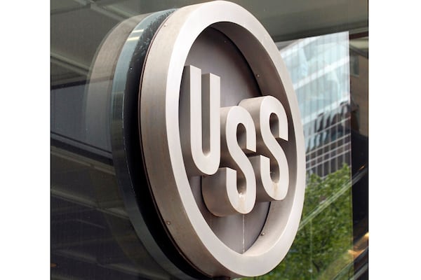 FILE - This April 26, 2010, file photo shows the United States Steel logo outside the headquarters building in downtown Pittsburgh. (AP Photo/Gene J. Puskar, File)