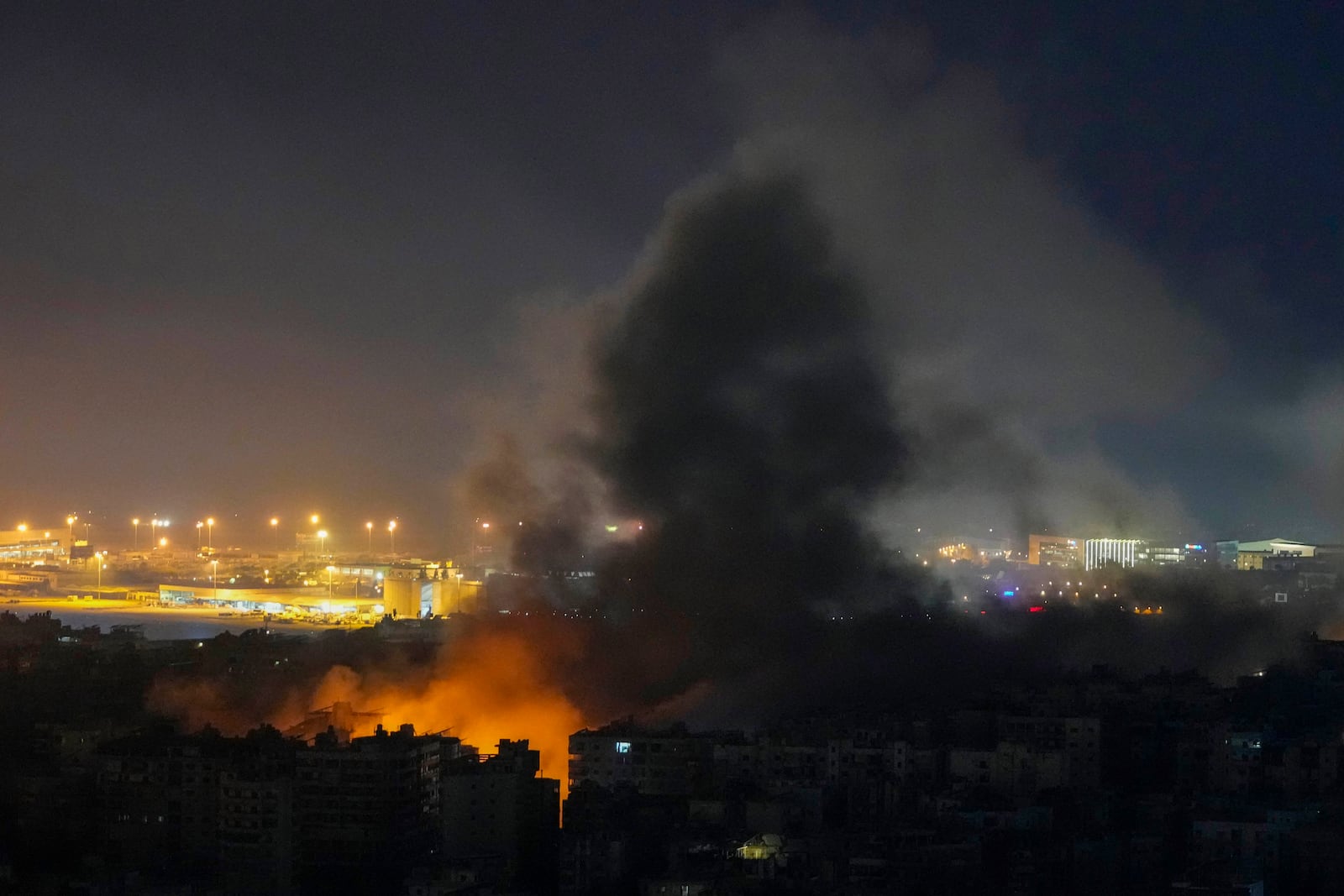 Smoke rises from an Israeli airstrike in Dahiyeh, Beirut, Lebanon, Tuesday, Oct. 22, 2024. (AP Photo/Hassan Ammar)