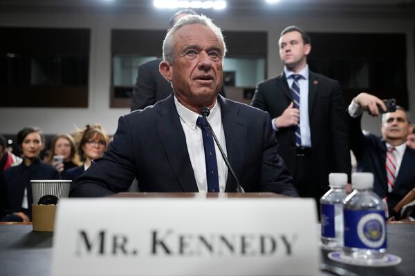 Robert F. Kennedy Jr., President Donald Trump's choice to be Secretary of Health and Human Services, appears before the Senate Finance Committee for his confirmation hearing, at the Capitol in Washington, Wednesday, Jan. 29, 2025. (AP Photo/Ben Curtis)