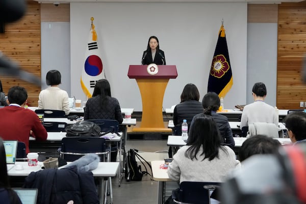 Lee Jin, spokeswoman of the South Korean Constitutional Court, speaks during a press conference at the court in Seoul, South Korea, Monday, Dec. 16, 2024. (AP Photo/Ahn Young-joon)