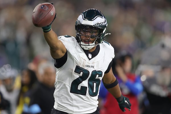 Philadelphia Eagles running back Saquon Barkley (26) reacts after a run against the Los Angeles Rams during the second half of an NFL football game in Inglewood, Calif., Sunday, Nov. 24, 2024. (AP Photo/Ryan Sun)