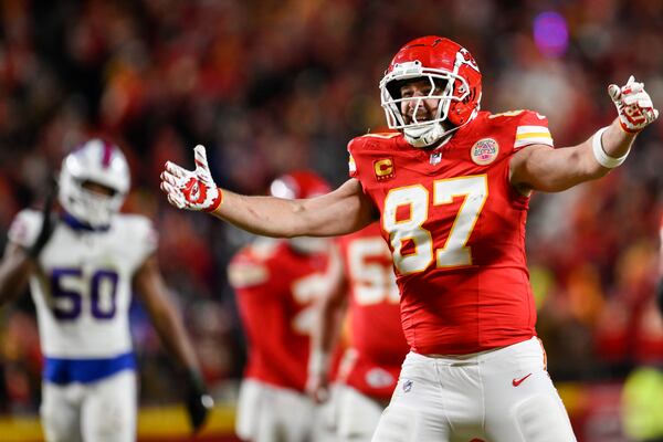 Kansas City Chiefs tight end Travis Kelce (87) reacts to a win over Buffalo Bills during the second half of the AFC Championship NFL football game, Sunday, Jan. 26, 2025, in Kansas City, Mo. (AP Photo/Reed Hoffmann)