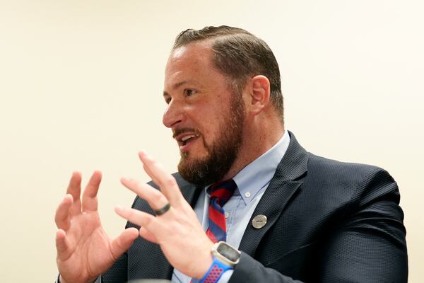 Nicholas Ferro, principal of Rice Intermediate School, talks about the student experience Tuesday, Aug. 27, 2024, in San Carlos, Ariz. (AP Photo/Ross D. Franklin)