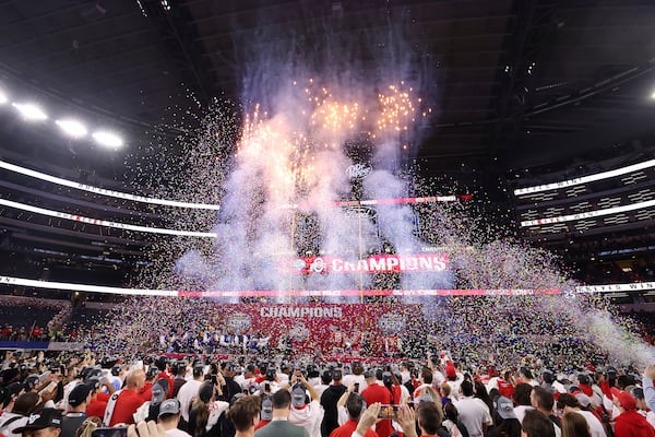 People celebrate after Ohio State defeated Texas in the Cotton Bowl College Football Playoff semifinal game, Friday, Jan. 10, 2025, in Arlington, Texas. (AP Photo/Gareth Patterson)