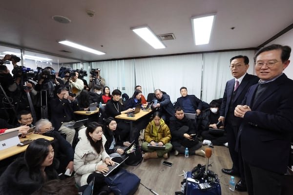 Seok Dong-hyeon and Yoon Kab-keun, right, lawyers for South Korea's impeached President Yoon Suk Yeol, attend a press conference in Seoul, South Korea, Thursday, Jan. 9, 2025. (Lee Jin-wook/Yonhap via AP)