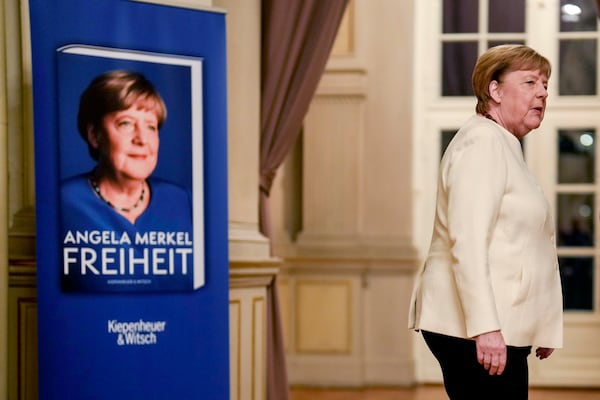 Former German Chancellor Angela Merkel arrives for the presentation of her memories in Berlin, Germany, Tuesday, Nov. 26, 2024. Book title reads "Freedom". (AP Photo/Markus Schreiber)