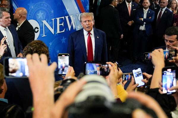 FILE - Republican presidential nominee, former President Donald Trump speaks to reporters in the spin room after a presidential debate in Philadelphia, Sept. 10, 2024. (AP Photo/Matt Rourke, File)