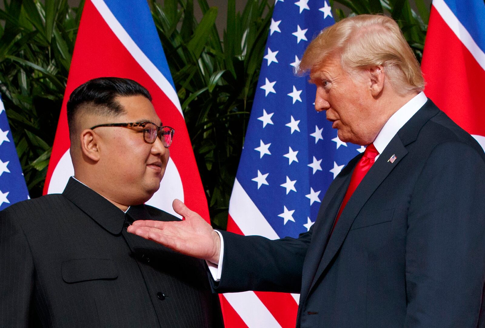 FILE - U.S. President Donald Trump, right, meets with North Korean leader Kim Jong Un on Sentosa Island in Singapore, on June 12, 2018. (AP Photo/Evan Vucci, File)