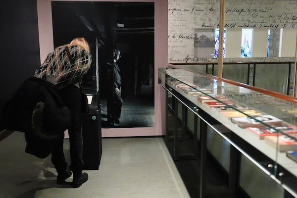 A person looks at the "Anne Frank the Exhibition" during its opening on International Holocaust Remembrance Day at the Center for Jewish History, Monday, Jan. 27, 2025, in New York. (AP Photo/Julia Demaree Nikhinson)