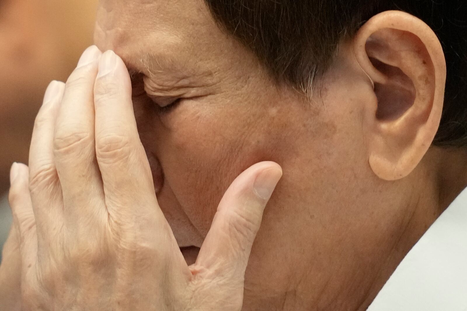 Former Philippine President Rodrigo Duterte gestures during a senate inquiry on the so-called war on drugs during his administration at the Philippine Senate Monday, Oct. 28, 2024, in Manila, Philippines. (AP Photo/Aaron Favila)