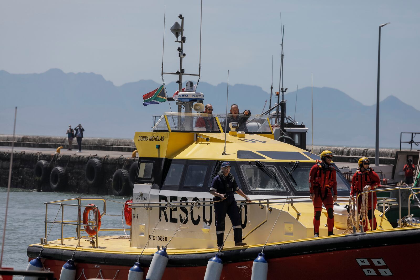 Britain's Prince William, the Prince of Wales, arrives on board a National Sea Rescue Institute (NSRI) boat to meet 2023 Earthshot finalist ABALOBI, at Kalk Bay Harbour, near Cape Town, Thursday, Nov. 7, 2024. (Gianluigi Guercia/Pool Photo via AP)