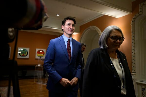 Canada's Prime Minister Justin Trudeau and Gov. Gen. Mary Simon depart after Dominic LeBlanc, not shown, was sworn in as Finance Minister during a ceremony at Rideau Hall in Ottawa, Ontario, Monday, Dec. 16, 2024. (Justin Tang/The Canadian Press via AP)