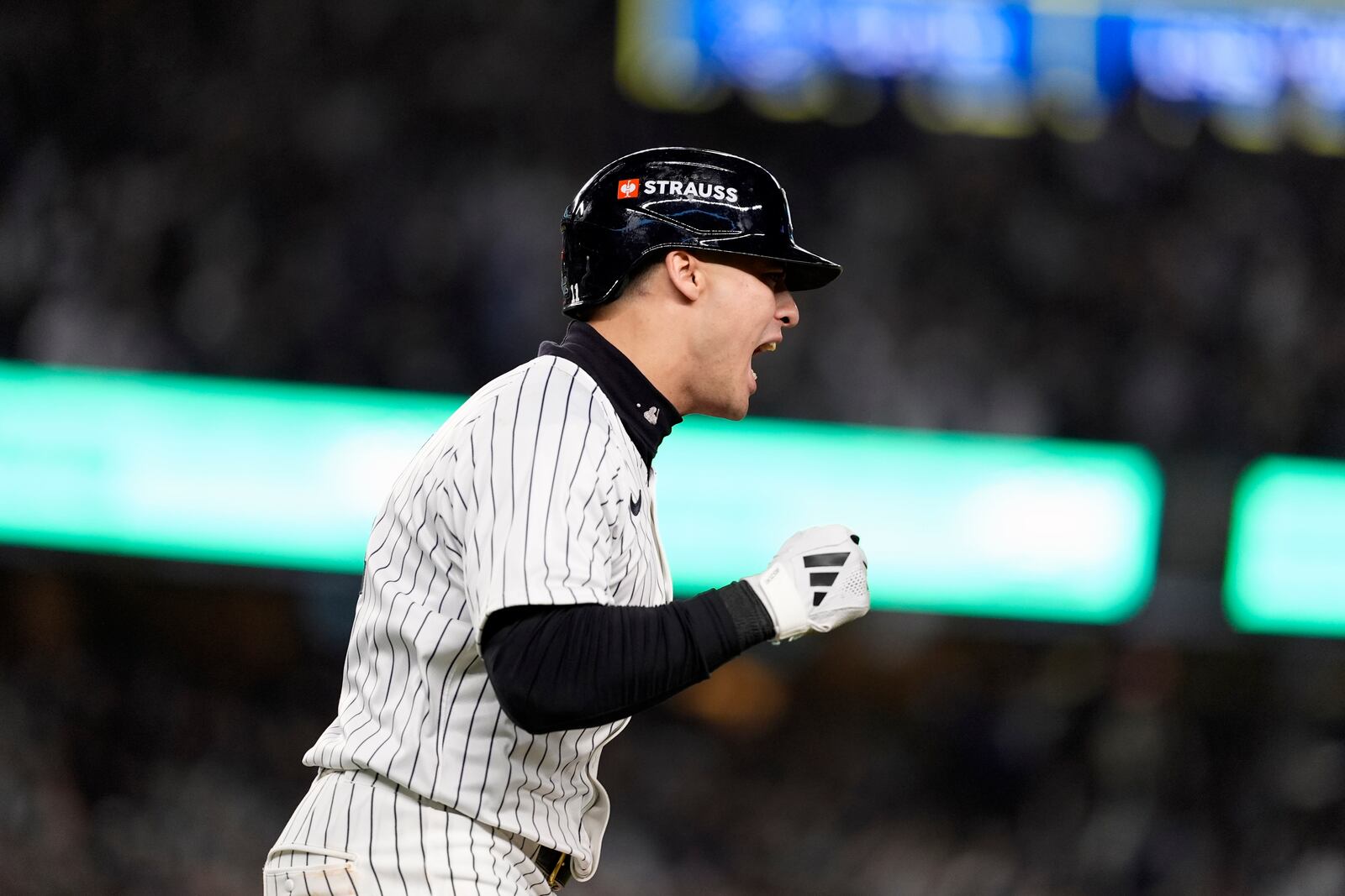 New York Yankees' Anthony Volpe celebrates after hitting a grand slam against the Los Angeles Dodgers during the third inning in Game 4 of the baseball World Series, Tuesday, Oct. 29, 2024, in New York. (AP Photo/Godofredo A. Vásquez)