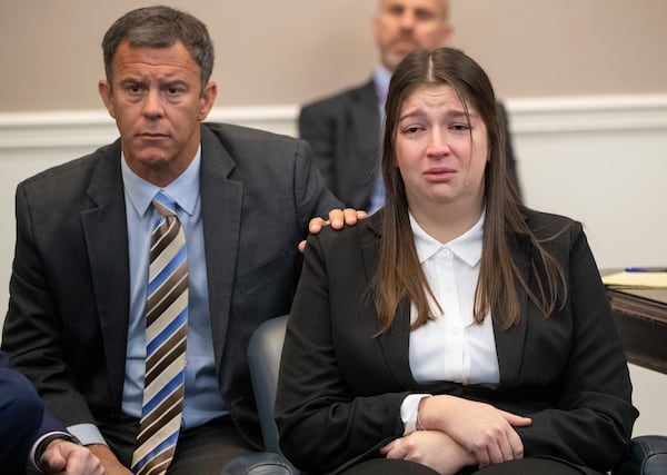 Tears fall down the cheeks of Jamie Lee Komoroski as family members of Samantha Miller speak about Miller during the plea hearing for Komoroski at Charleston County Court, Monday, Dec. 2, 2024, in Charleston, S.C. (Henry Taylor/The Post And Courier via AP)