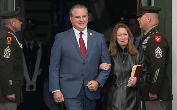 FILE - Florida's Chief Financial Officer Jimmy Patronis and his wife Katie arrive for the inauguration ceremony at the Old Capitol, where Gov. Ron DeSantis was sworn in for his second term, in Tallahassee, Fla., Jan. 3, 2023. (AP Photo/Lynne Sladky, File)