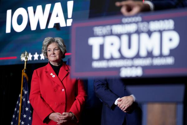 FILE - Susie Wiles watches as Republican presidential candidate former President Donald Trump speaks at a caucus night party in Des Moines, Iowa, Jan. 15, 2024. (AP Photo/Andrew Harnik, File)