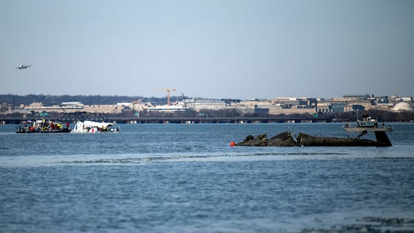 In this image provided by the U.S. Coast Guard, wreckage is seen in the Potomac River near Ronald Reagan Washington National Airport, Thursday, Jan. 30, 2025 in Washington. (Petty Officer 2nd Class Taylor Bacon, U.S. Coast Guard via AP)