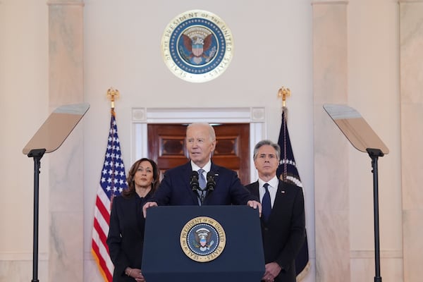 President Joe Biden, center, with Vice President Kamala Harris, left, and Sec. of State Anthony Blinken, right, speaks in the Cross Hall of the White House on the announcement of a ceasefire deal in Gaza and the release of dozens of hostages after more than 15 months of war, Wednesday, Jan. 15, 2025, in Washington. (AP Photo/Evan Vucci)