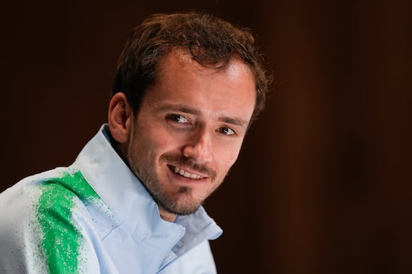 Russia's Daniil Medvedev reacts during a press conference ahead of the Australian Open tennis championship in Melbourne, Australia, Friday, Jan. 10, 2025. (AP Photo/Ng Han Guan)