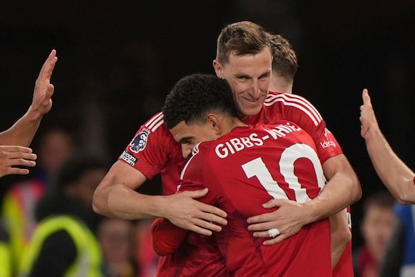 Nottingham Forest's Chris Wood, facing, celebrates scoring with teammate Morgan Gibbs-White during the English Premier League soccer match between Nottingham Forest and Ipswich Town at City Ground, Nottingham, England, Saturday Nov. 30, 2024. (Joe Giddens/PA via AP)