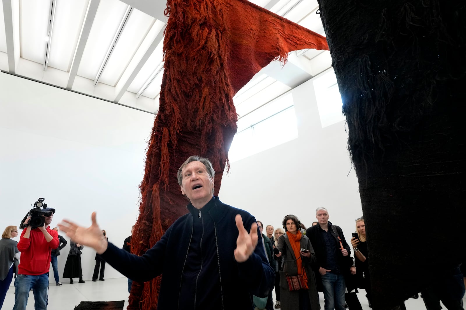 American architect Thomas Phifer speaks to reporters in the new Museum of Modern Art in Warsaw, Poland, on Thursday Oct. 24, 2024. (AP Photo/Czarek Sokolowski)