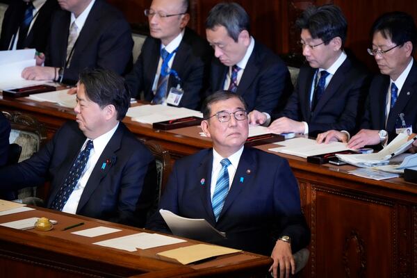 Japan's Prime Minister Shigeru Ishiba prepares to deliver a policy speech marking the start of this year's parliamentary session in Tokyo, Friday, Jan. 24, 2025. (AP Photo/Eugene Hoshiko)