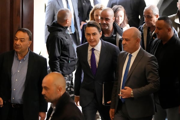 Amos Hochstein, center, a senior adviser to President Joe Biden, is received ahead of a meeting with Lebanese Parliament speaker Nabih Berri, in Beirut, Lebanon, Tuesday, Nov. 19, 2024. (AP Photo/Hassan Ammar)