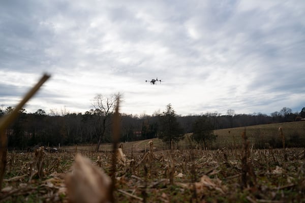 Russell Hedrick's DJI drone puts crop cover on his farm, Tuesday, Dec. 17, 2024, in Hickory, N.C. (AP Photo/Allison Joyce)