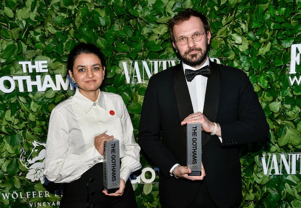 Indian filmmaker Payal Kapadia, left, and producer Thomas Hakim pose with the best international feature award for "All We Imagine as Light" during The Gothams Film Awards at Cipriani Wall Street on Monday, Dec. 2, 2024, in New York. (Photo by Evan Agostini/Invision/AP)