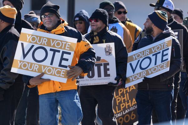 Members of the Alpha Phi Alpha fraternity march in the 36th annual Dr. Martin Luther King Jr. Parade in Garland, Texas, Saturday, Jan. 18, 2025. (AP Photo/LM Otero)