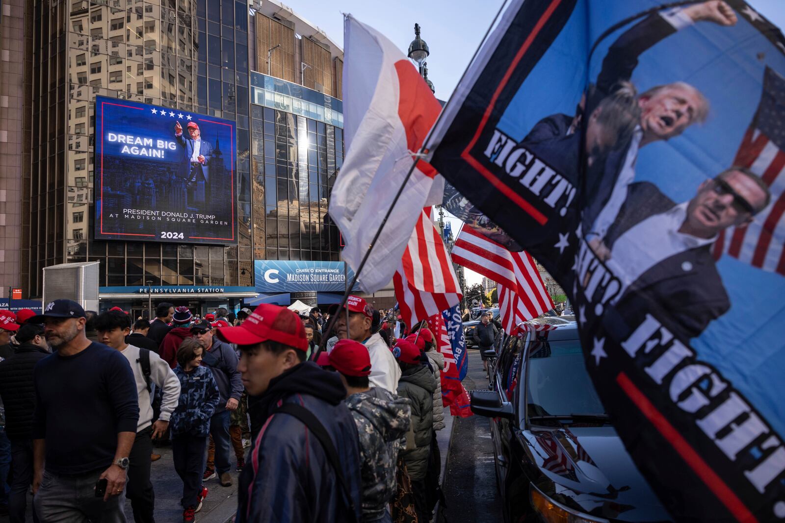 Supporters of Republican presidential nominee former President Donald Trump gather for his campaign rally outside Madison Square Garden, Sunday, Oct. 27, 2024, in New York. (AP Photo/Yuki Iwamura)