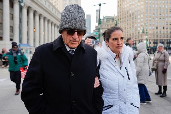 Erden Arkan, left, leaves federal court, Friday, Jan. 10, 2025, in New York after pleading guilty to a charge alleging that he worked with a Turkish government official to funnel illegal campaign contributions to New York City Mayor Eric Adams. (AP Photo/Julia Demaree Nikhinson)