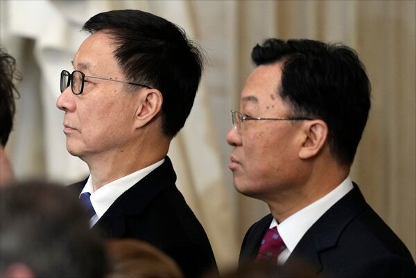 China's Vice President Han Zheng stands with Xie Feng, China's Ambassador to the U.S., right, during the 60th Presidential Inauguration in the Rotunda of the U.S. Capitol in Washington, Monday, Jan. 20, 2025. (AP Photo/Julia Demaree Nikhinson, Pool)