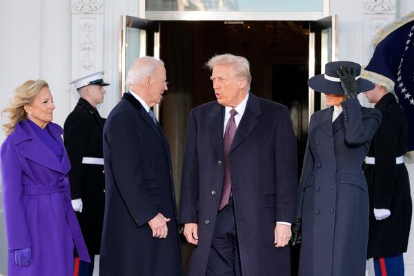 President-elect Donald Trump and Melania Trump are greeted by President Joe Biden and first lady Jill Biden, upon their arrival at the White House, Monday, Jan. 20, 2025, in Washington. (AP Photo/Alex Brandon)