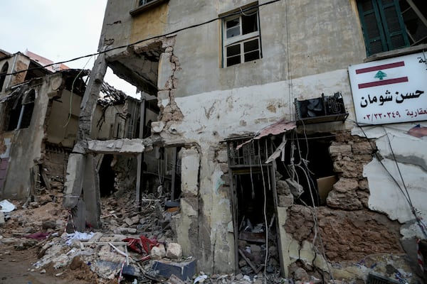 A destroyed building hit on Monday evening by an Israeli airstrike is seen in central Beirut, Lebanon, Tuesday, Nov. 19, 2024. (AP Photo/Bilal Hussein)