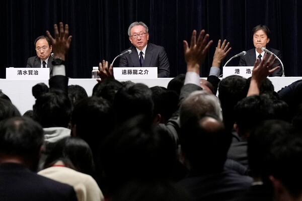 From left, Kenji Shimizu, newly appointed president and CEO of Fuji Television Network, Ryunosuke Endo, vice chairman of the Board of Fuji Television Network, and Koichi Minato, outgoing president and CEO of Fuji Television Network, attend a news conference at the Fuji Television headquarters in Tokyo, Monday, Jan. 27, 2025. (AP Photo/Eugene Hoshiko)